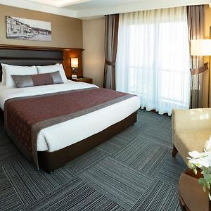 Suite met een King Size Bed op de Hoek